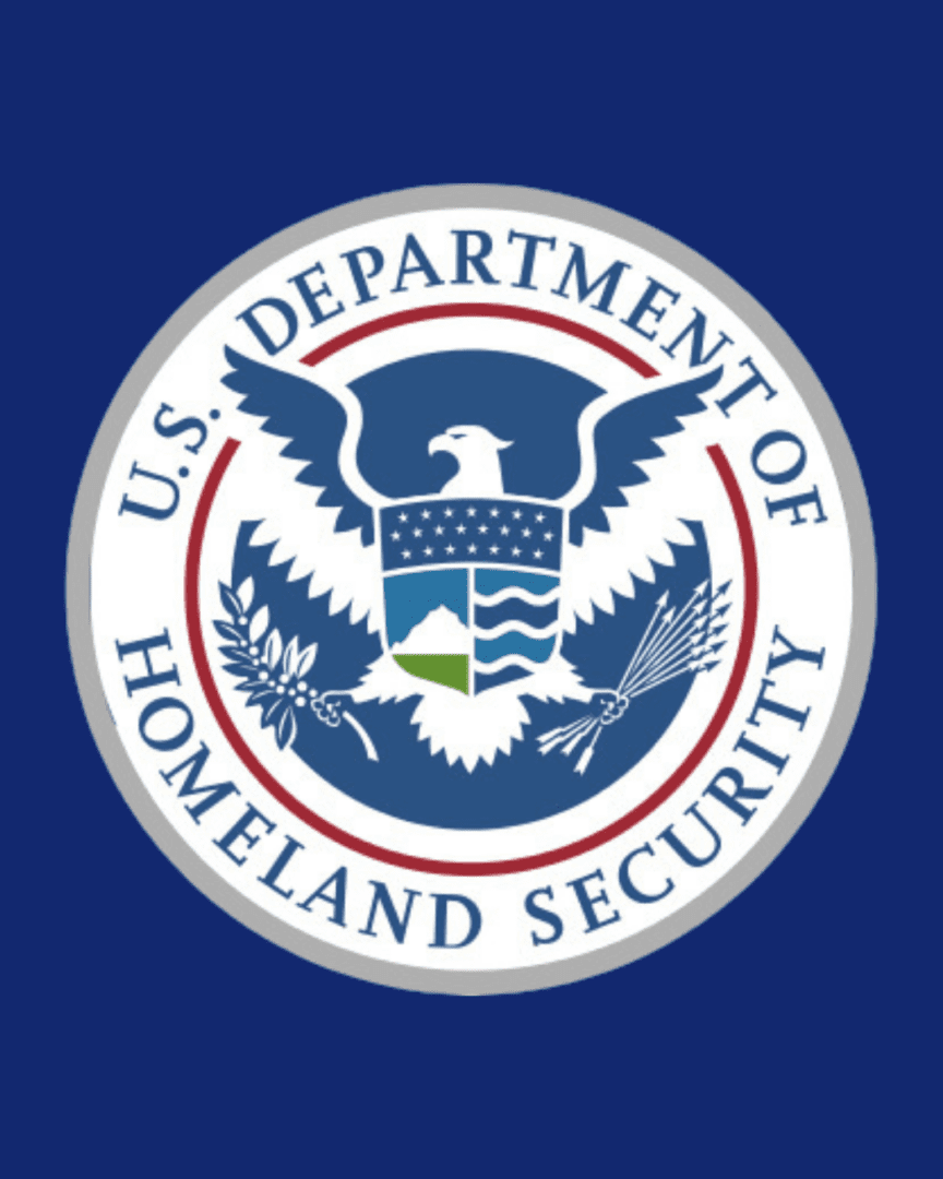 A blue background with the seal of the department of homeland security.