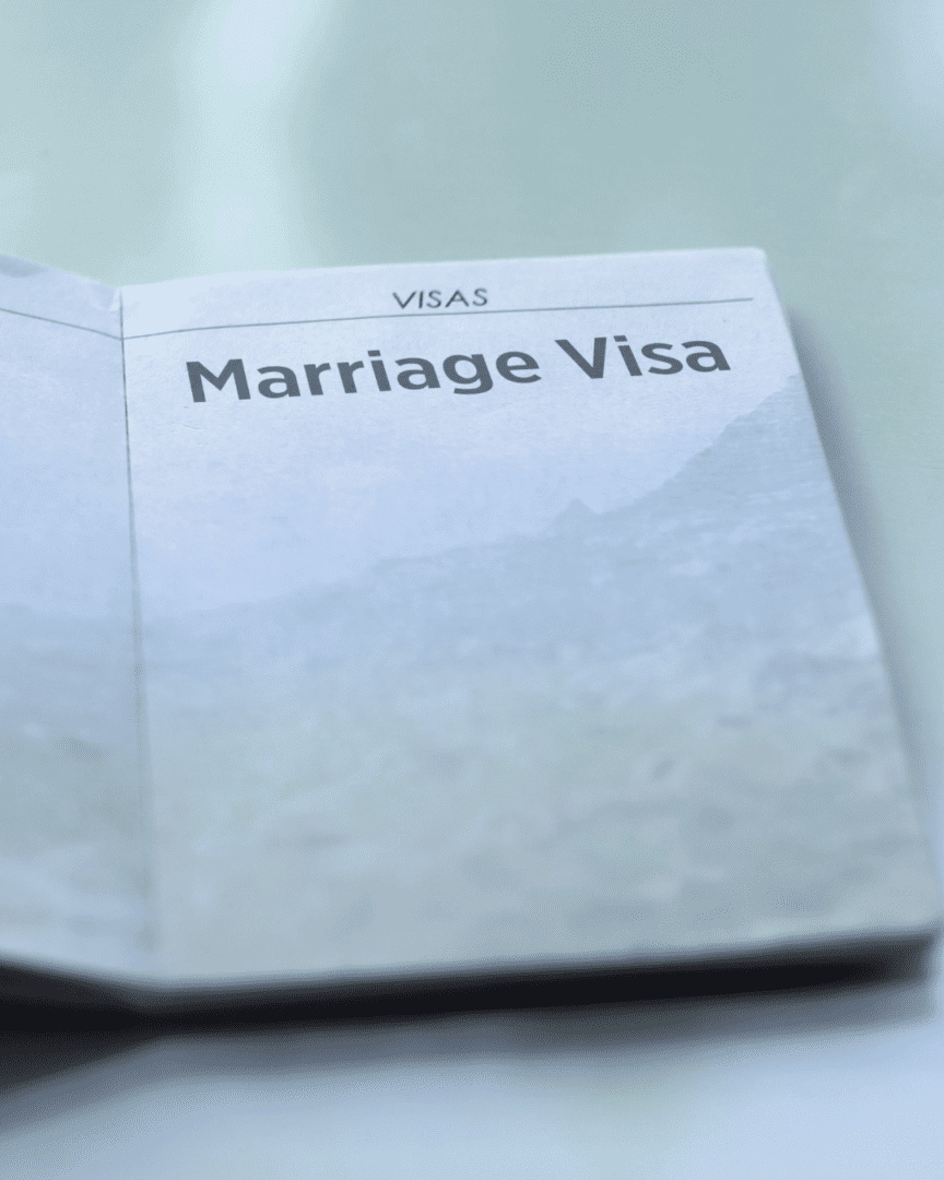 A marriage visa is shown on the table.